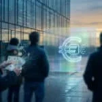 Cinematic image of people observing a glowing digital euro symbol as physical banknotes and coins transform into data streams, against a modern building.