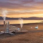 Usine de traitement de lithium moderne sur les rives de la Salton Sea au coucher du soleil avec des cristaux géants.